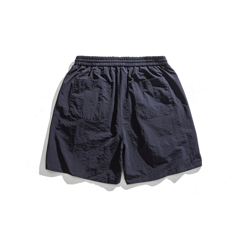 Lockere Sportshorts mit schlichter Buchstabenstickerei