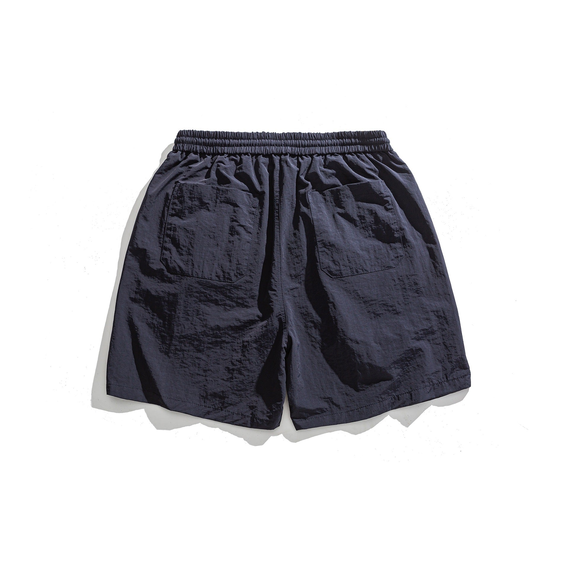 Lockere Sportshorts mit schlichter Buchstabenstickerei