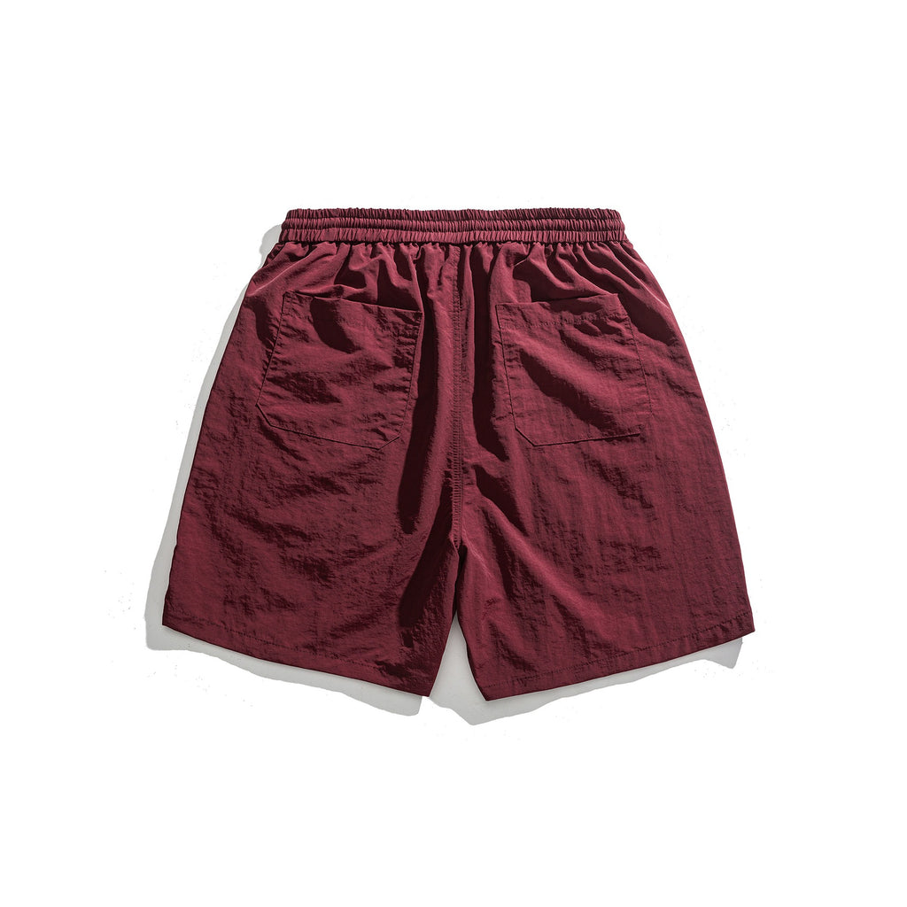Lockere Sportshorts mit schlichter Buchstabenstickerei