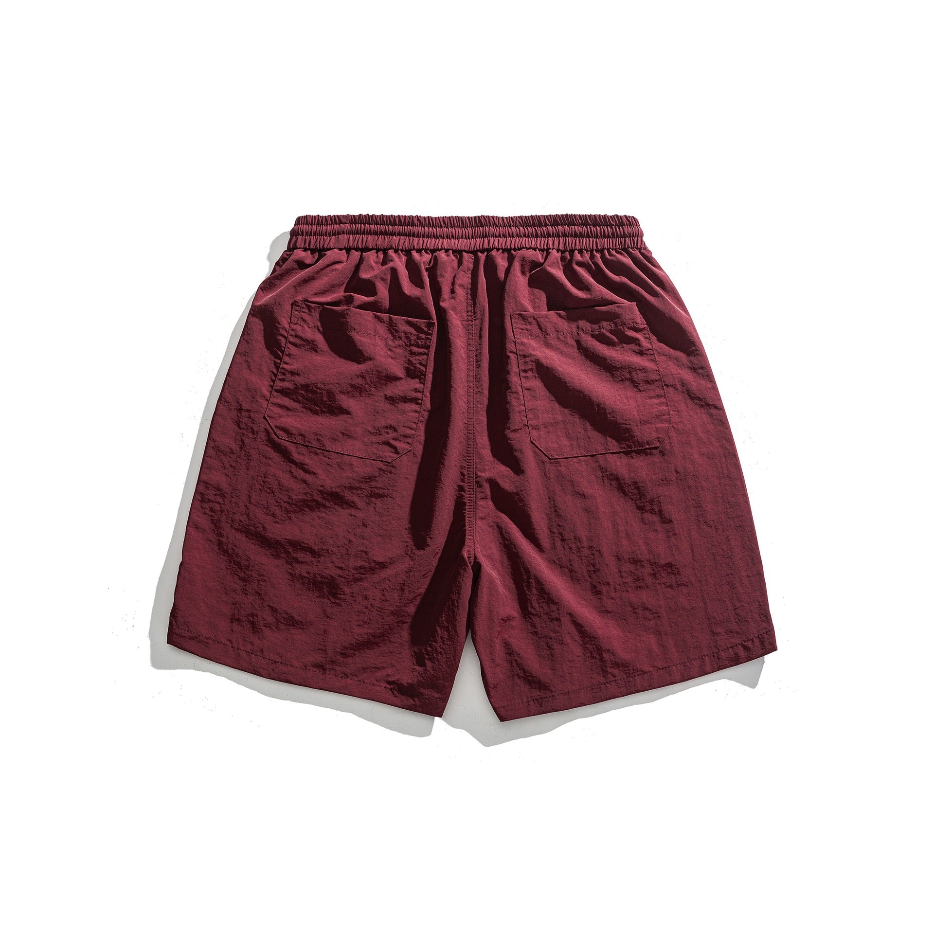Lockere Sportshorts mit schlichter Buchstabenstickerei